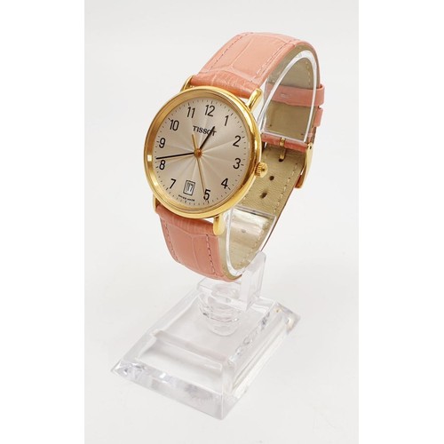 31 - A ladies Tissot quartz wrist watch model T882K. UK shipping £14.