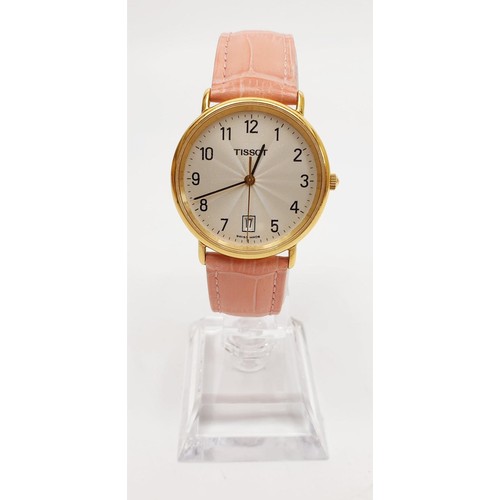 31 - A ladies Tissot quartz wrist watch model T882K. UK shipping £14.