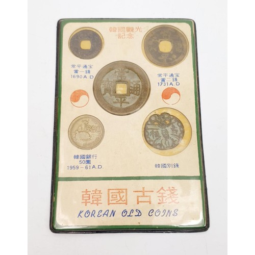 48 - A pack of five Korean old coins. UK shipping £14.