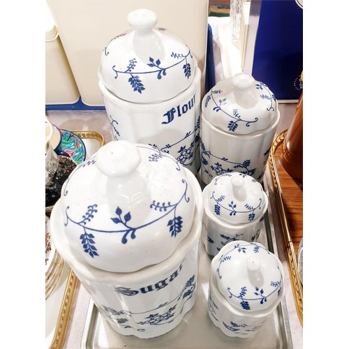 161 - Five ceramic blue and white canisters, the tallest 11