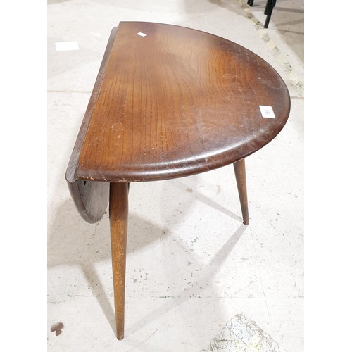 188 - A vintage Ercol drop leaf coffee table, width 23.5