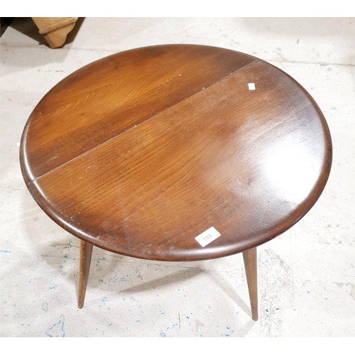 188 - A vintage Ercol drop leaf coffee table, width 23.5