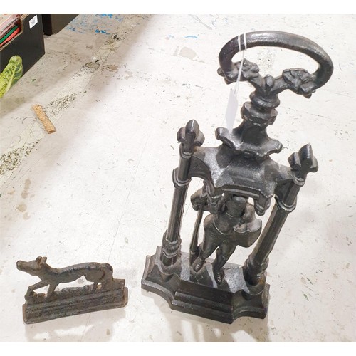 203 - A Victorian cast iron door stop, height 17.5