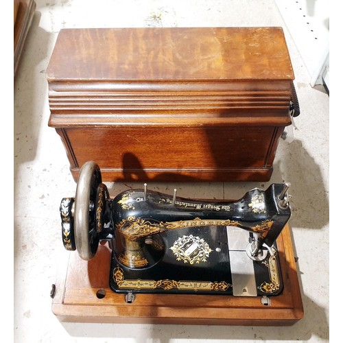 227 - A vintage Singer sewing machine. No shipping. Arrange collection or your own packer and shipper, ple... 