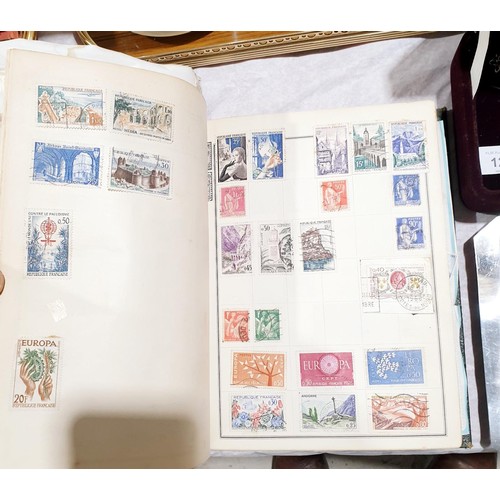 119 - Two stamp albums. UK shipping £14.