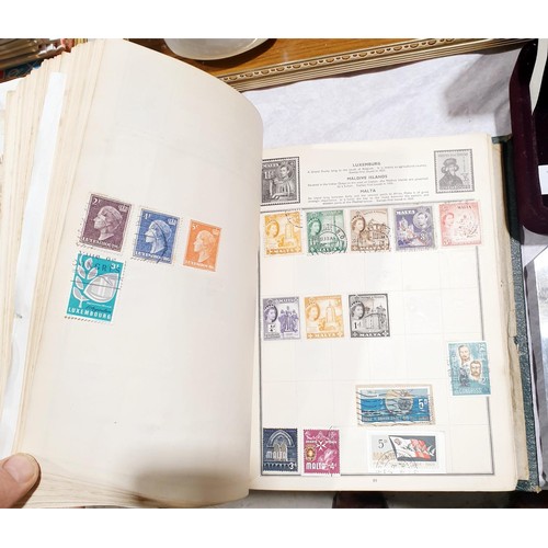 119 - Two stamp albums. UK shipping £14.