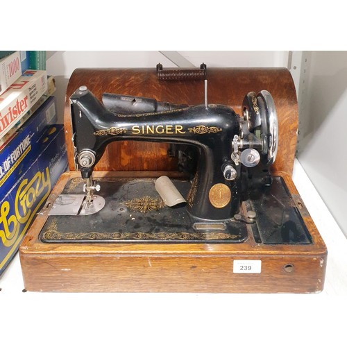 239 - A vintage Singer sewing machine. No shipping. Arrange collection or your own packer and shipper, ple... 