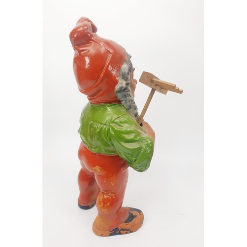 294 - A vintage ceramic gnome A/F, height 11.25