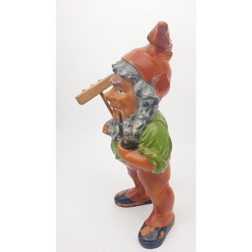 294 - A vintage ceramic gnome A/F, height 11.25