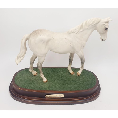 295 - Two Royal Doulton model horses: Red Rum and Desert Orchid, height 9