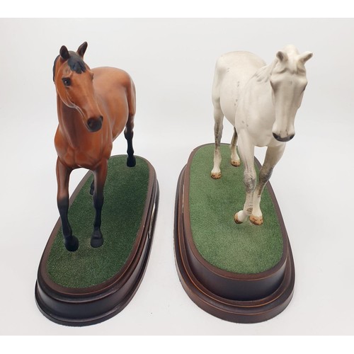 295 - Two Royal Doulton model horses: Red Rum and Desert Orchid, height 9