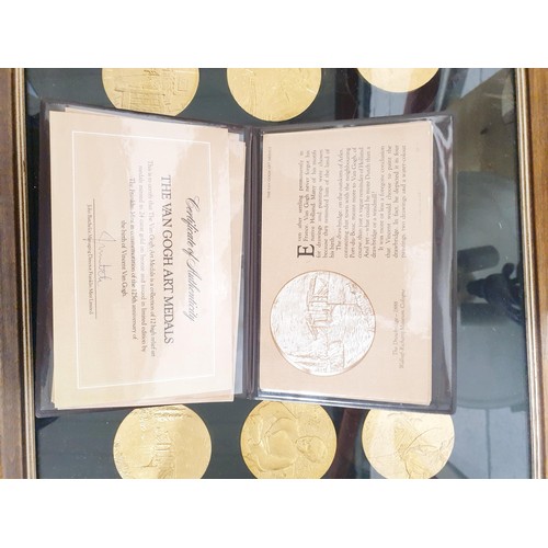 315 - A framed collection of twelve The Van Gogh medals with certificates, diameter 2.5