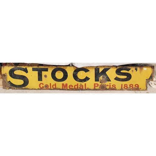 326 - A vintage enamel Stocks advertising sign, 16