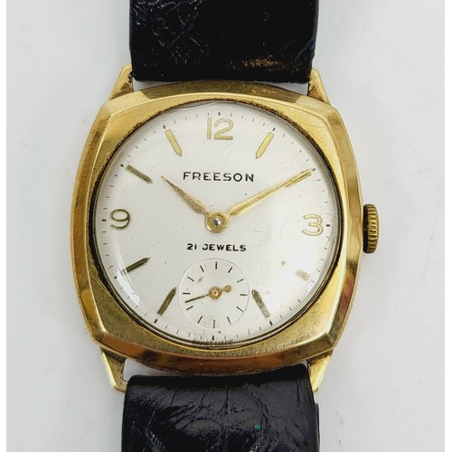 22 - A vintage gentleman's 9ct gold cased Freeson mechanical wrist watch, case weight excluding movement ... 