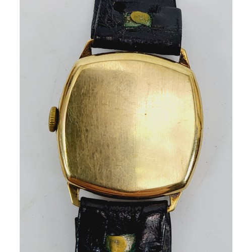 22 - A vintage gentleman's 9ct gold cased Freeson mechanical wrist watch, case weight excluding movement ... 