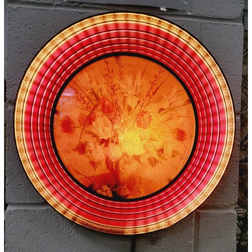 285 - A 1960s kitsch wall lamp, diameter 18