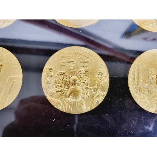 315 - A framed collection of twelve The Van Gogh medals with certificates, diameter 2.5