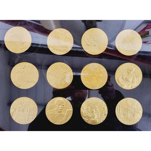 315 - A framed collection of twelve The Van Gogh medals with certificates, diameter 2.5