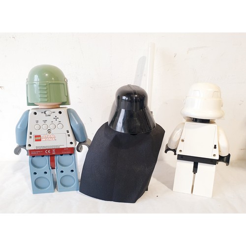 42 - A Lego Star Wars Boba Fett alarm clock, a Darth Vader LED torch and a Stormtrooper LED torch. UK shi... 