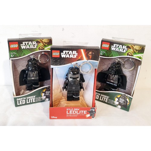 43 - A sealed Lego Star Wars Kylo Ren LED Key Lite, two Stormtrooper LED Lites and two Darth Vader LED Ke... 