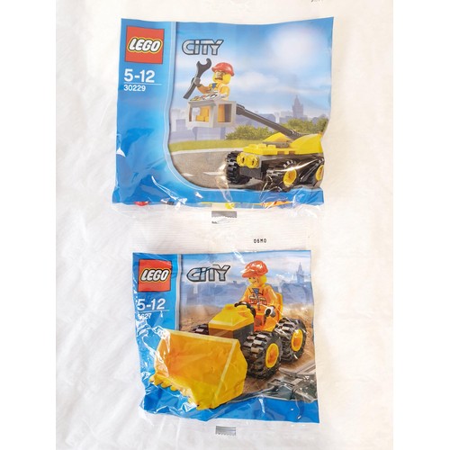 73 - Four sealed Lego City polybags: 