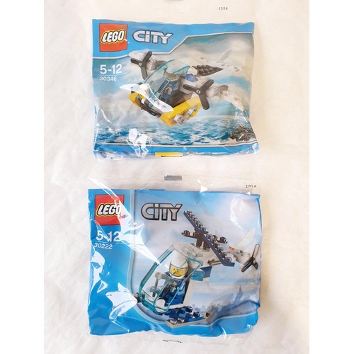 73 - Four sealed Lego City polybags: 