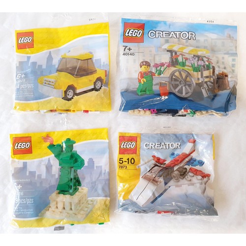 74 - Eight sealed Lego polybags: 