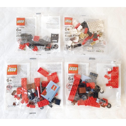 74 - Eight sealed Lego polybags: 