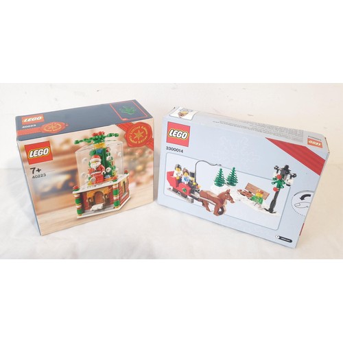 80 - A sealed Lego Christmas 2012 limited edition 3300014 together with a sealed Christmas Santa Snow Glo... 