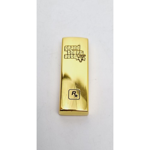 143 - A Grand Theft Auto V gold bar USB stick. UK shipping £14.