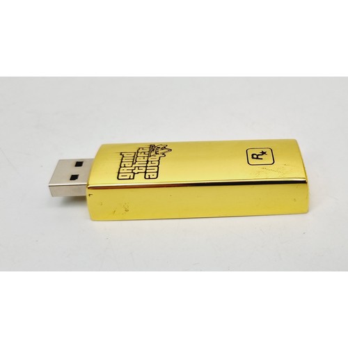 143 - A Grand Theft Auto V gold bar USB stick. UK shipping £14.