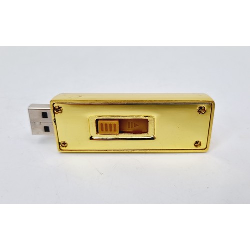 143 - A Grand Theft Auto V gold bar USB stick. UK shipping £14.