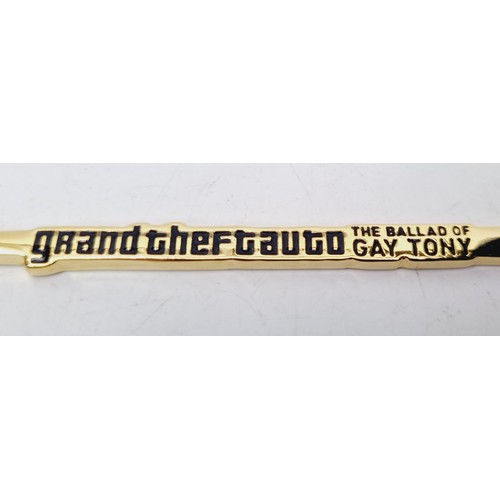 157 - A Grand Theft Auto Ballad of Gay Tony gold plated spoon. UK shipping £14.