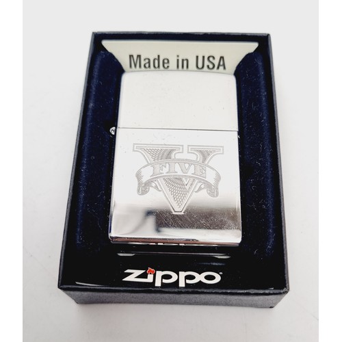 159 - A boxed Grand Theft Auto V Zippo lighter. UK shipping £14.