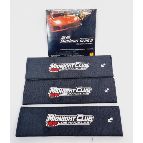 203 - Midnight Club promotional items: three Los Angeles seat belt covers/pads, a soundtrack sampler, keyr... 