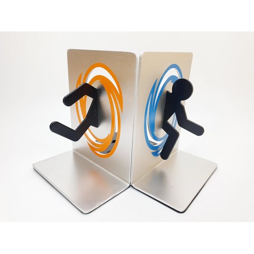 113 - A set of scarce boxed ThinkGeek Portal 2 aluminium Video Game Bookends. UK shipping £14.