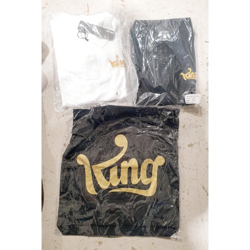 124 - A King Games Black tracksuit hoodie, size large, a sealed tote bag, a sealed white polo shirt, size ... 