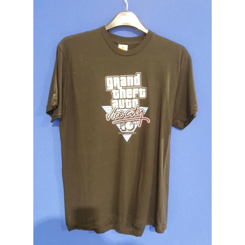 128 - Two Grand Theft Auto Vice City 10th Anniversary black tee shirts, size large and a grey tee shirt, s... 