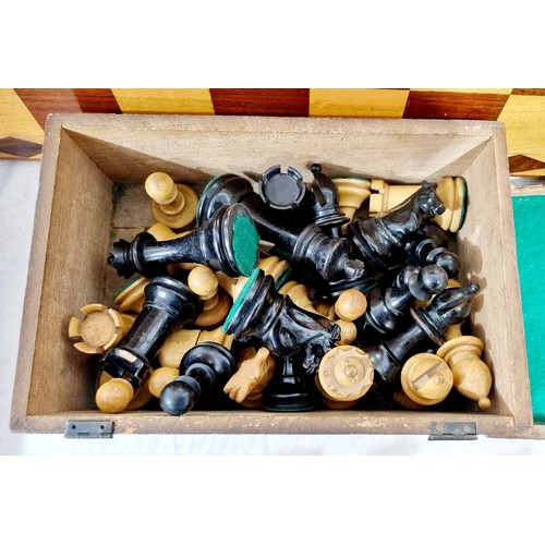 217 - A vintage Staunton style weighted wooden chess set, one piece A/F, and a board. UK shipping £14.