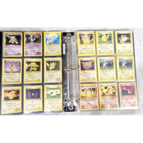 247 - A folder of 270 Pokemon cards including Holos which include Team Rocket's Mewtwo, with approx. seven... 