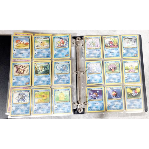 247 - A folder of 270 Pokemon cards including Holos which include Team Rocket's Mewtwo, with approx. seven... 