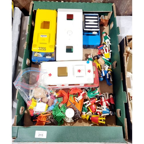 215 - Two boxes of vintage Playmobil figures and accessories including Lufthansa shuttle bus, caravan and ... 