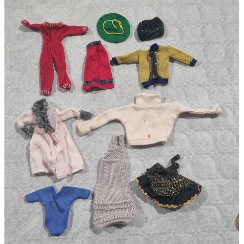 192 - A selection of vintage dolls clothing for Barbie or Sindy dolls. UK Shipping £14.