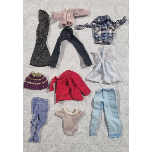 192 - A selection of vintage dolls clothing for Barbie or Sindy dolls. UK Shipping £14.