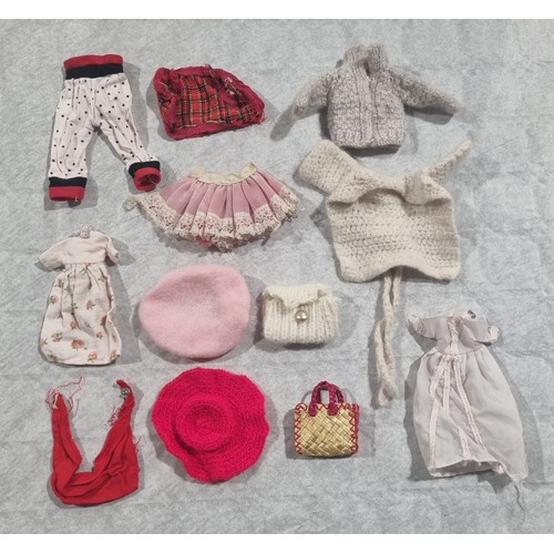 192 - A selection of vintage dolls clothing for Barbie or Sindy dolls. UK Shipping £14.