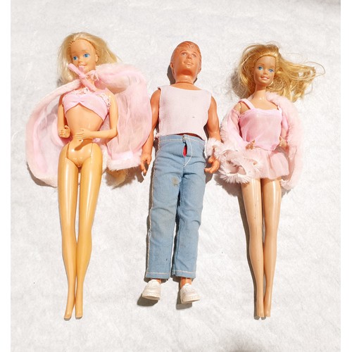 267 - Five vintage Sindy and Barbie dolls with a Ken style doll. UK Shipping £14.