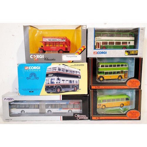 283 - Four boxed Corgi Buses including Nottingham and Ashton-U-Lyme with two Exclusive First Edition Halif... 