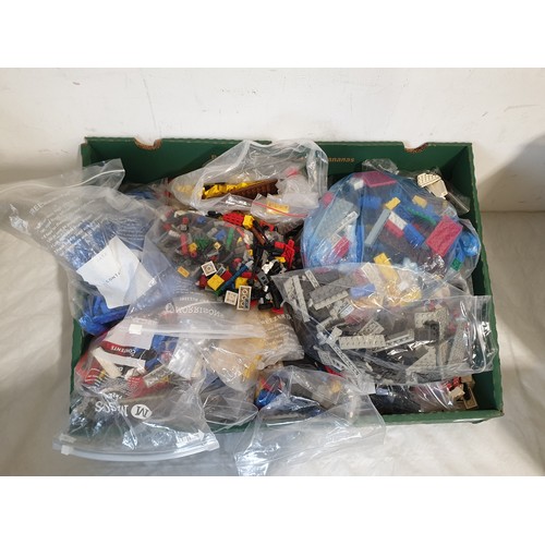 303 - A large box of mostly bagged and colour sorted Lego approx 6kg. UK shipping £14.