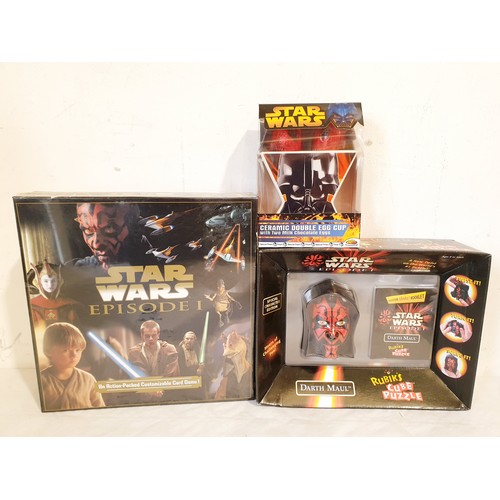 307 - A selection of new in packet Star Wars merchandise, mainly Episode I, including a Darth Maul Rubix C... 