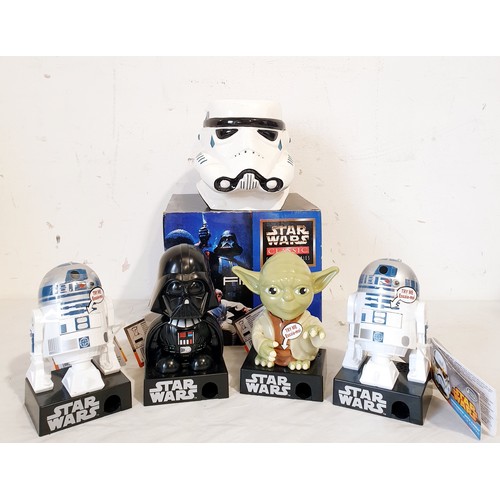 307 - A selection of new in packet Star Wars merchandise, mainly Episode I, including a Darth Maul Rubix C... 